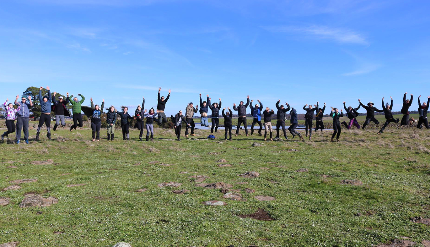 Young Rural Leaders Jumping, group photo.