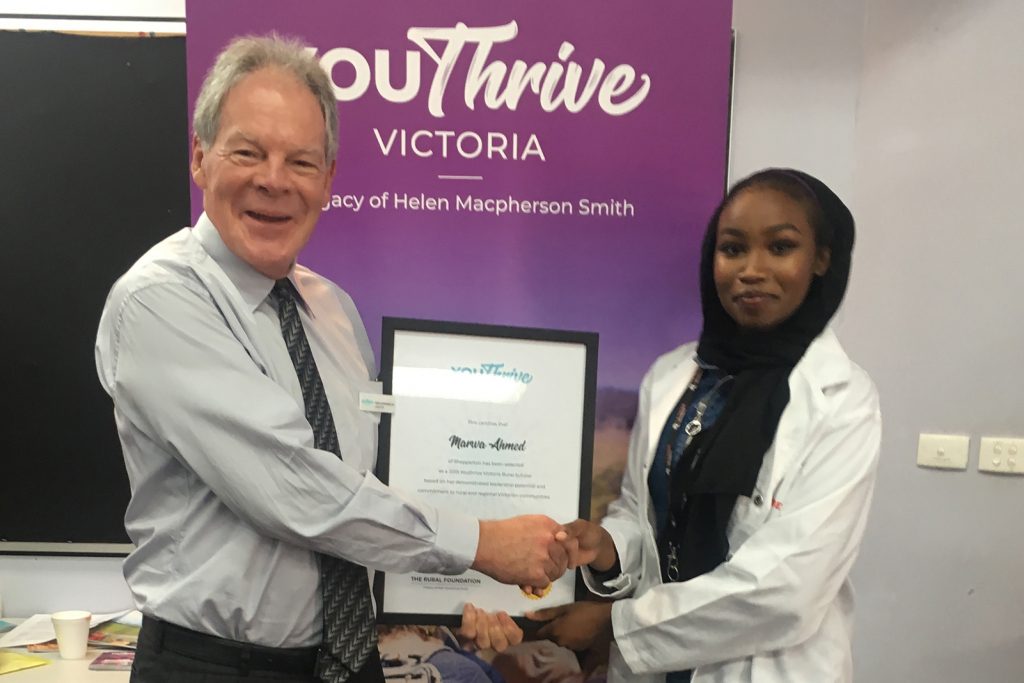 Marwa Ahmed from McGuire College Shepparton presented with scholarship certificate.